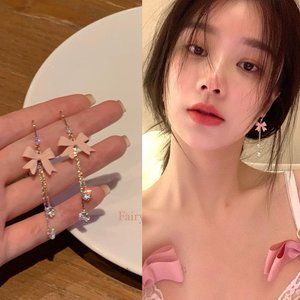 Bow tassel earrings female niche design sense senior temperament ear clip ins st